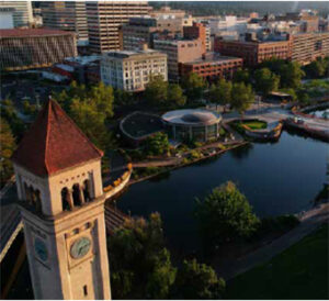 Downtown skyline with clock tower over water