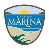 Marina city shield logo showing ocean sunset