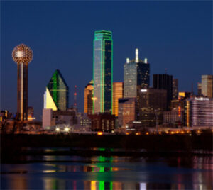 Dallas skyline at night with illuminated buildings