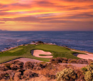 Coastal golf green at vibrant sunset