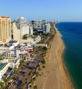 Aerial view of beachfront hotels and sand
