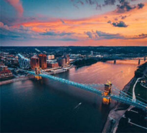 Aerial view of suspension bridge at sunset